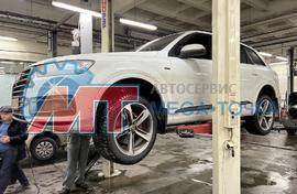 Замена передних тормозных колодок и техническое обслуживание автомобиля Audi Q7