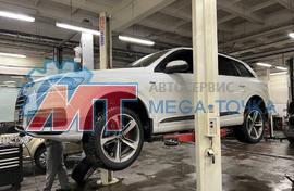 Замена передних тормозных колодок и техническое обслуживание автомобиля Audi Q7