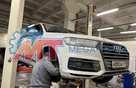 Замена передних тормозных колодок и техническое обслуживание автомобиля Audi Q7